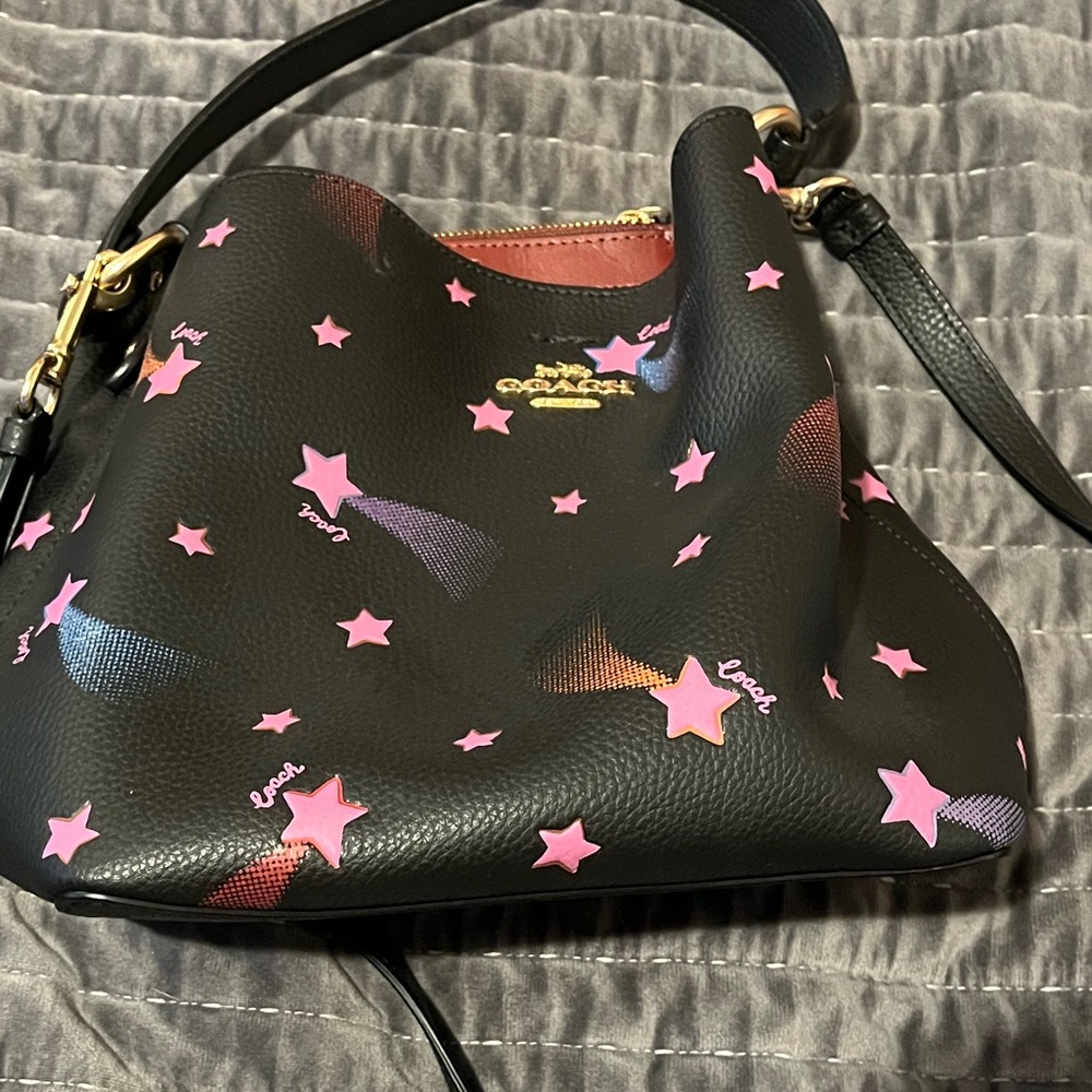Coach Pink and black star bucket bag